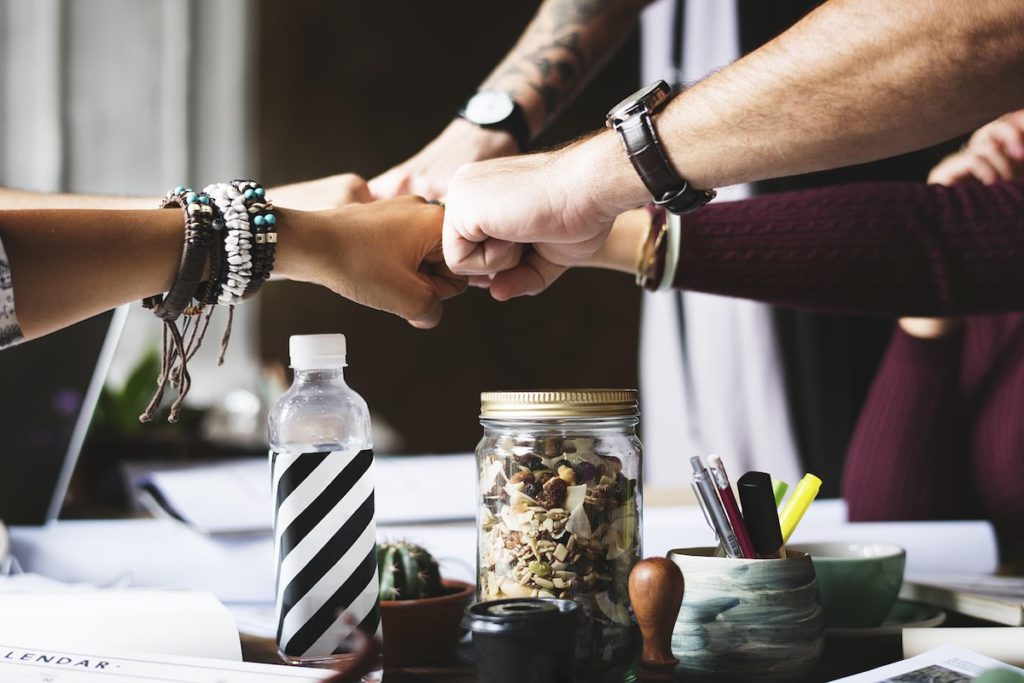 corporate fist bumping