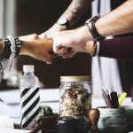 corporate fist bumping